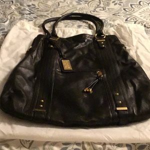 Gently used Badgley Mischka handbag with dust bag